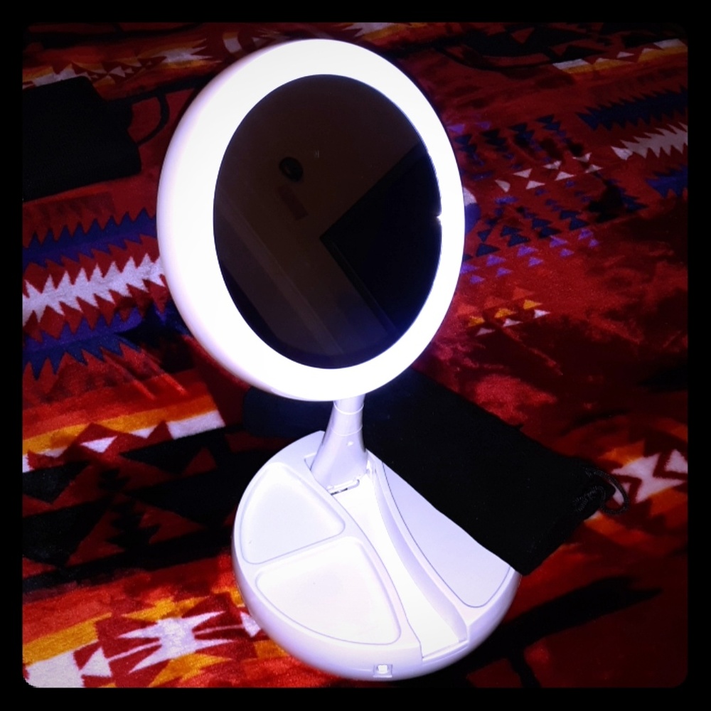 Vanity makeup mirror with little black bag